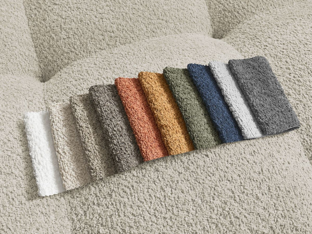 Canapé d'angle convertible réversible coffre ANAKIN tissu bouclette avec pouf