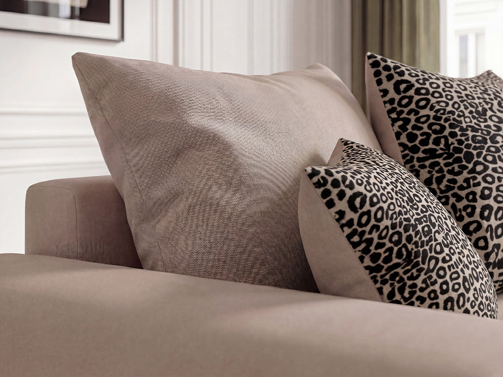 Canapé d'angle convertible réversible coffre SIDONIE avec coussins à motif léopard