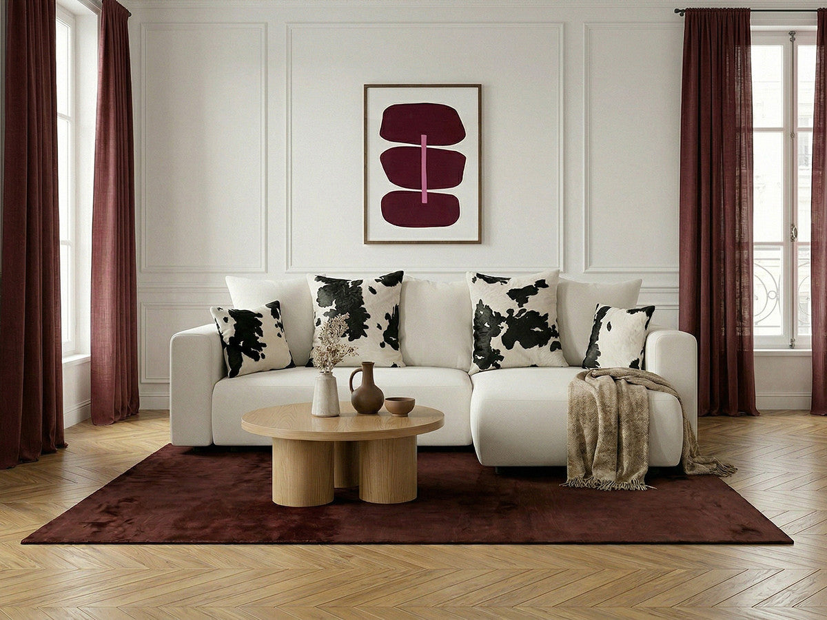Canapé d'angle convertible réversible coffre SIDONIE avec coussins à motif vache
