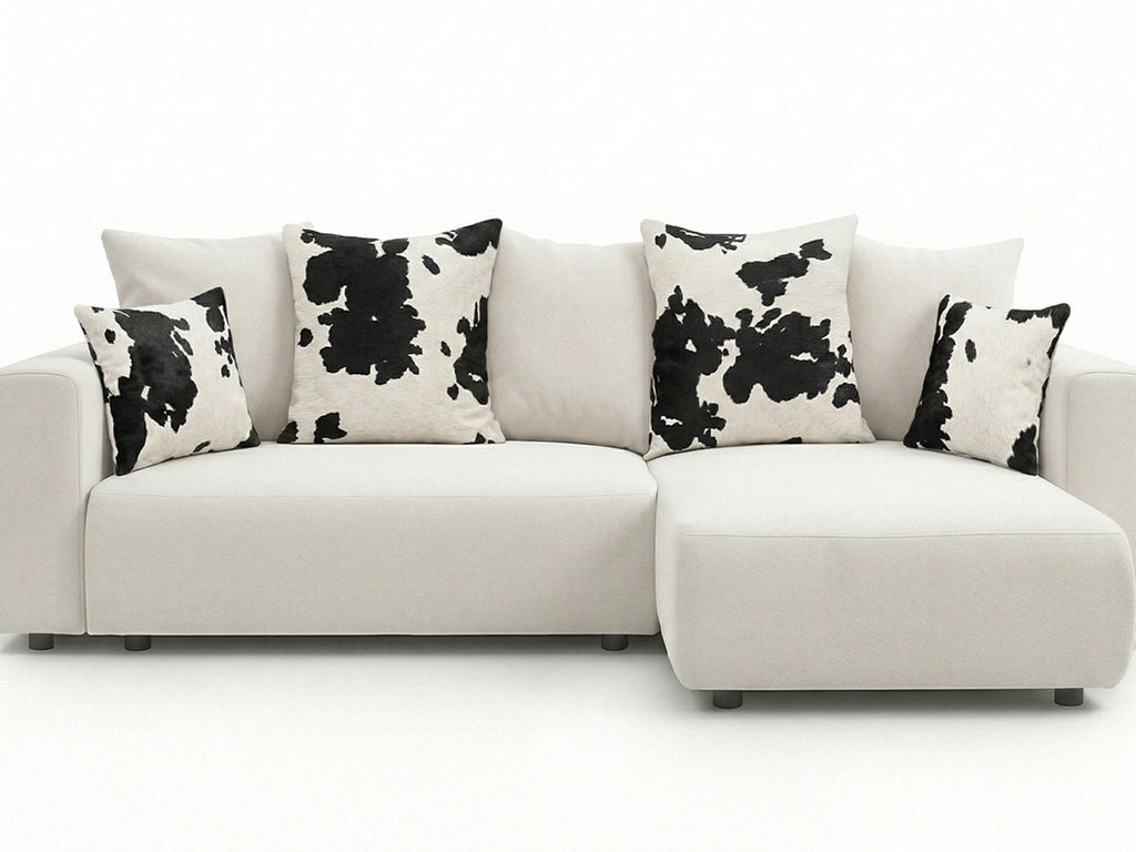 Canapé d'angle convertible réversible coffre SIDONIE avec coussins à motif vache