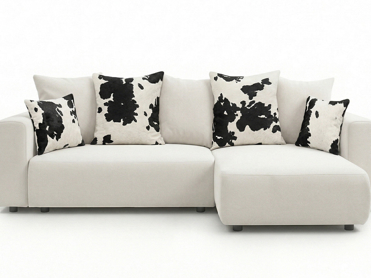 Canapé d'angle convertible réversible coffre SIDONIE avec coussins à motif vache