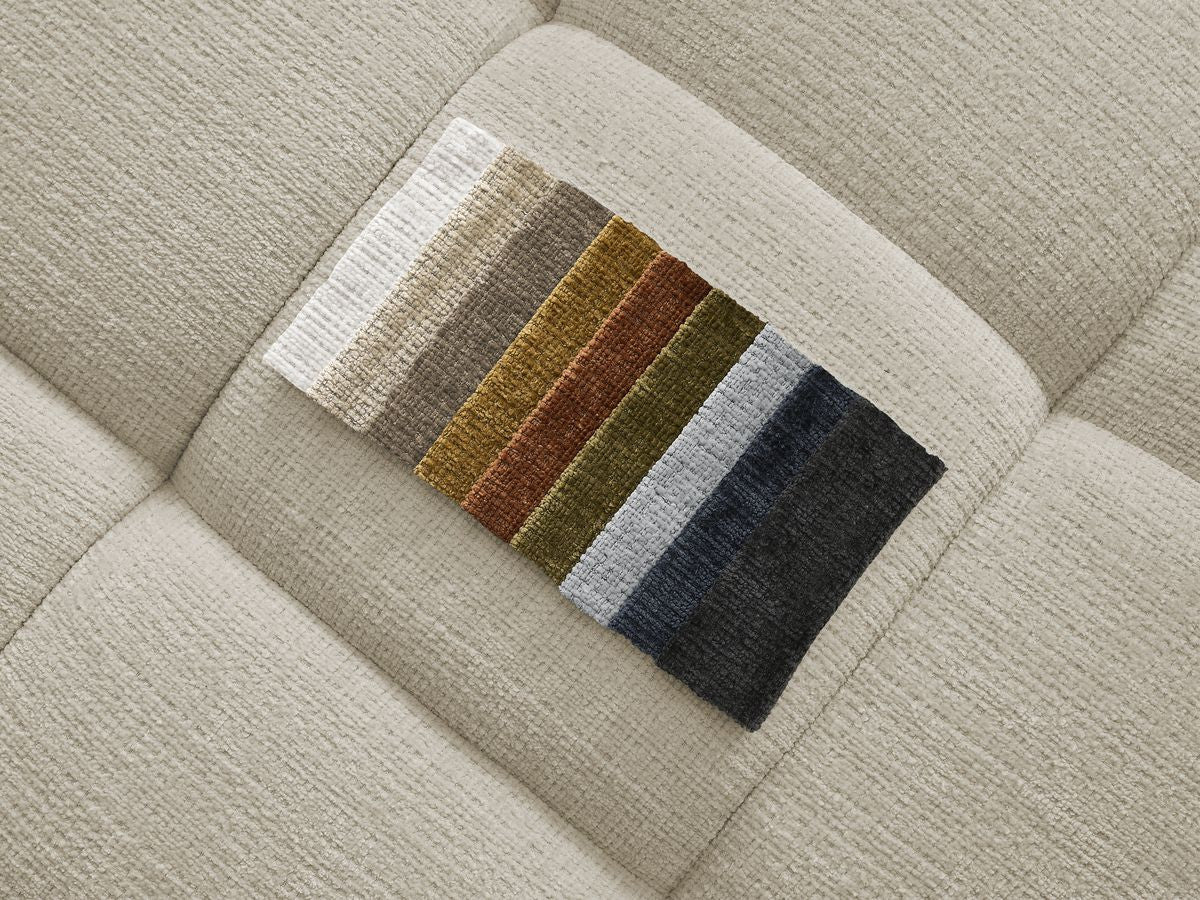 Canapé d'angle fixe IVANE avec dossier avance-recule en tissu texturé et son pouf