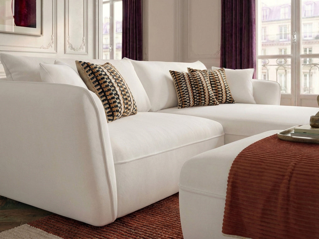 Canapé d'angle fixe LUIGI tissu lisse avec pouf