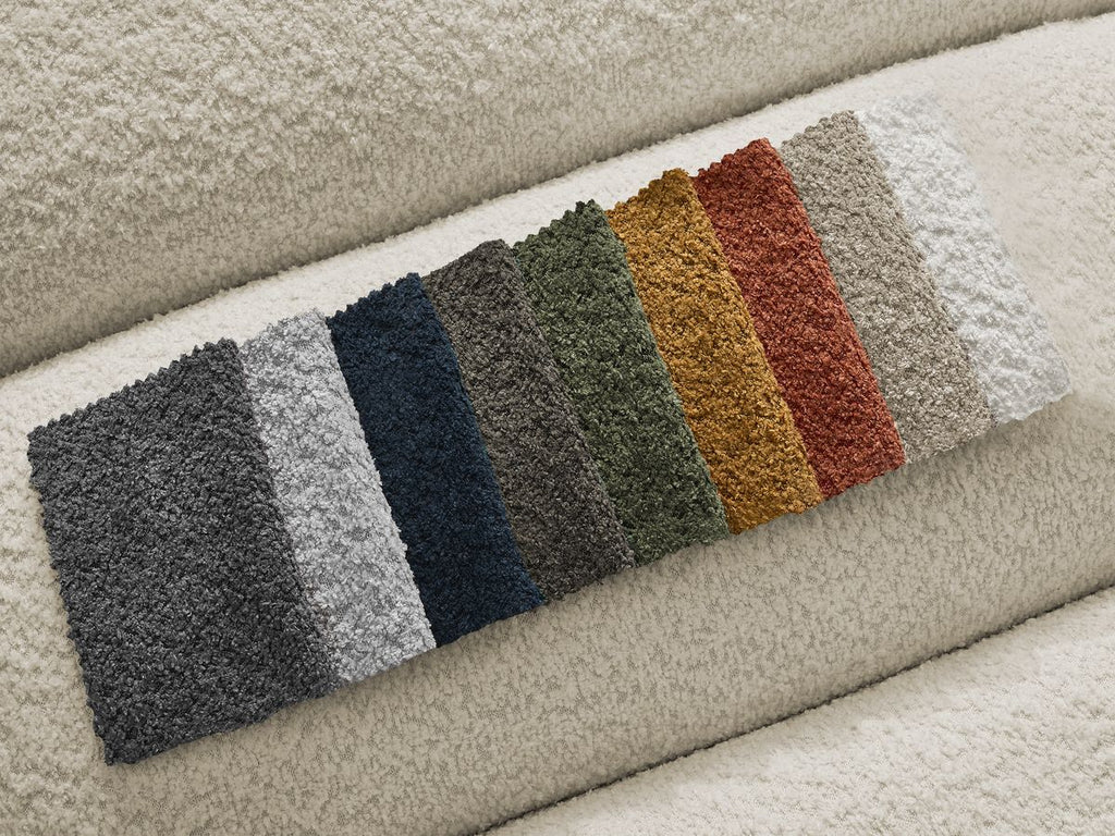 Canapé d'angle fixe modulable ANNECY tissu bouclette avec pouf