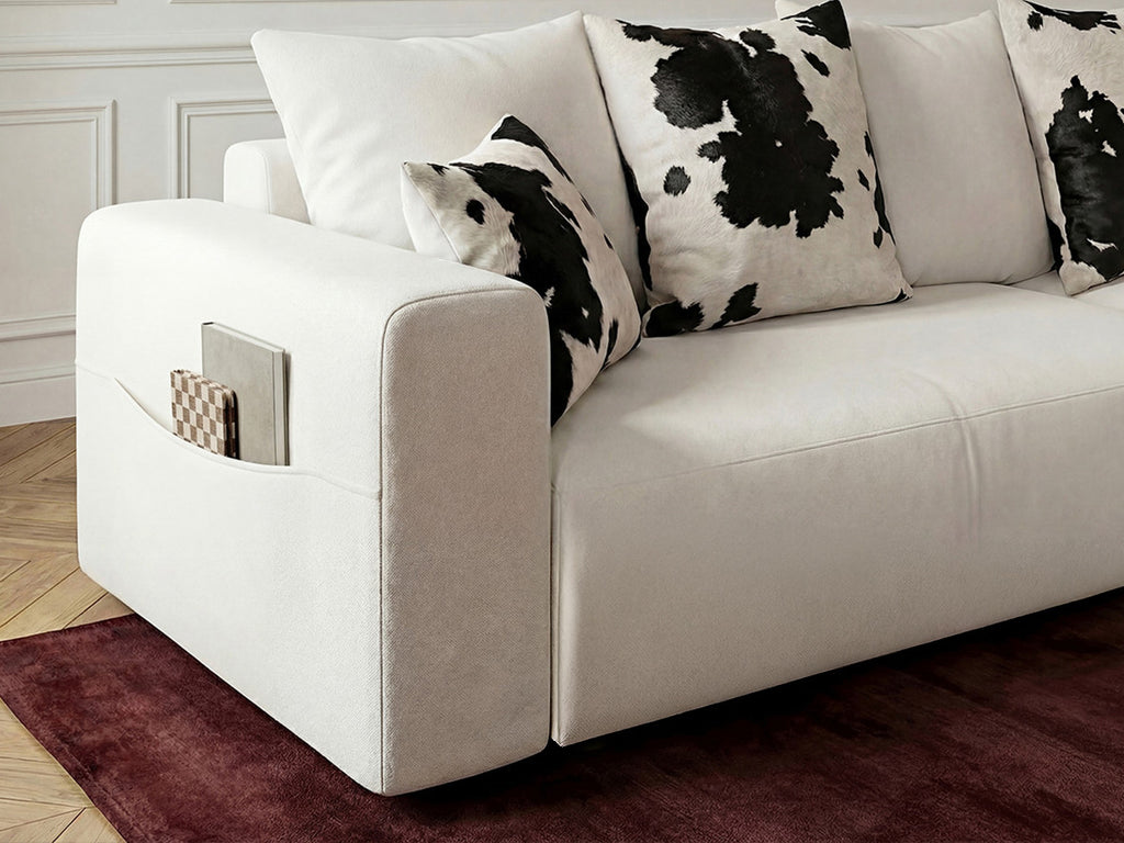 Canapé droit convertible SIDONIE avec coussins à motif vache