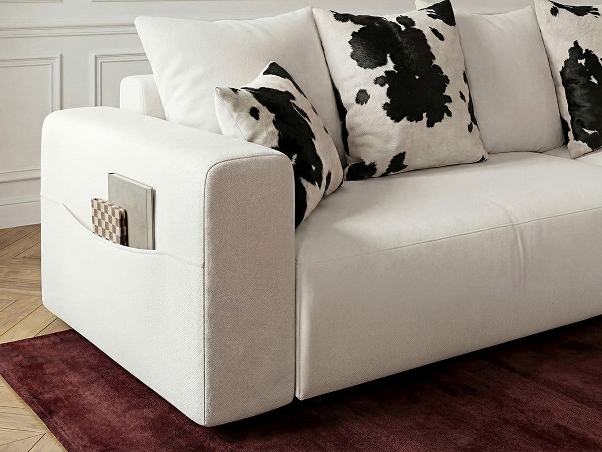 Canapé droit convertible SIDONIE avec coussins à motif vache